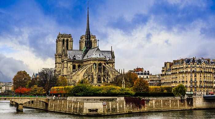 Picturesque cityscape of Seine and Cathedral of Notre Dame de Paris at autumn