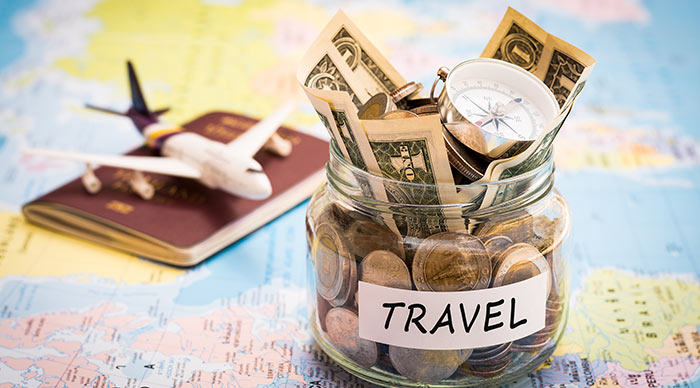 Money saved in a jar for travel
