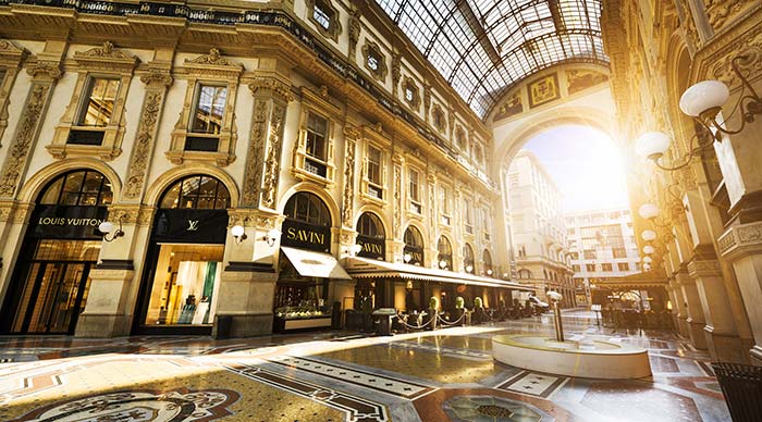 A shopping mall in Milan with shoppers and tourists strolling around