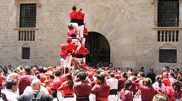 People building human castles at Fiesta de la Mercè Barcelona