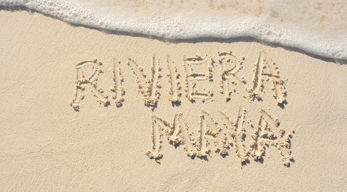 The Phrase Riviera Maya Written in the Sand on a Beach