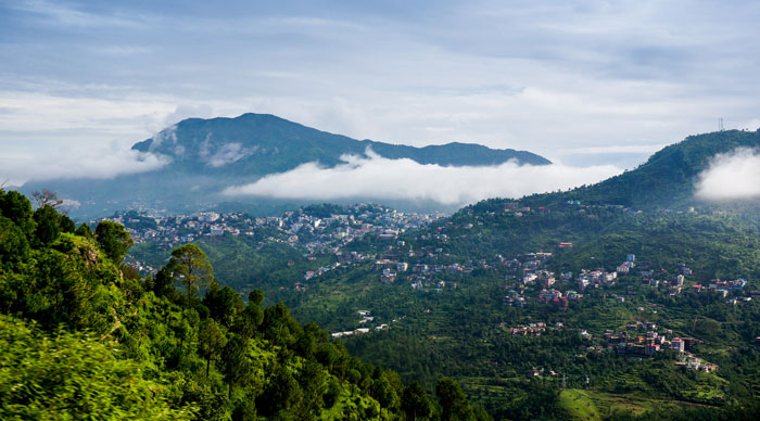 Clouds rolling between the hills of himachal pradesh