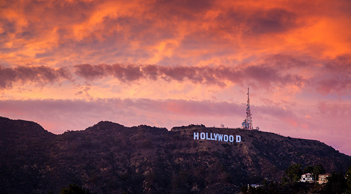  Distant view of Hollywood Sign on Mount Lee at sunset