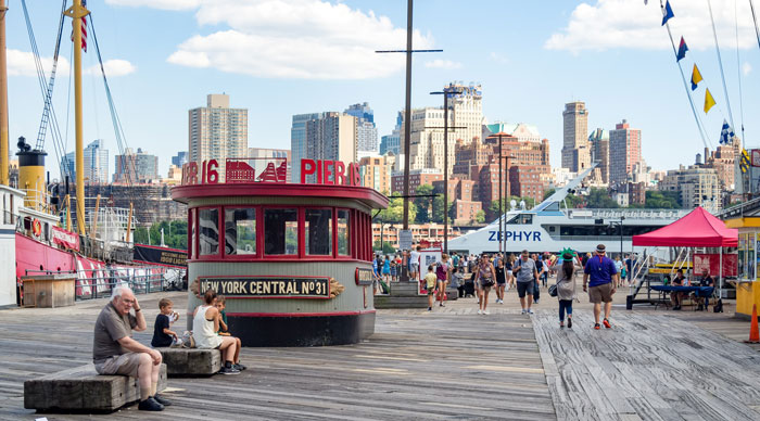 The South Street Seaport in downtown Manhattan with the Brooklyn skyline on the background