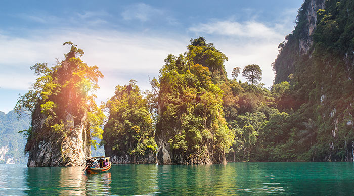 Beautiful mountains lake river sky and natural attractions in Ratchaprapha Dam at Khao Sok National Park Surat Thani Province Thailand